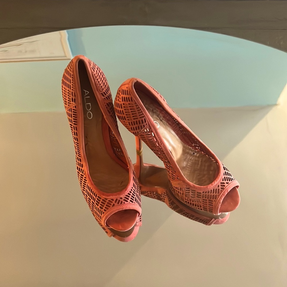 Hey ya, please check out orange heels from Aldo for $30.  super comfortable.